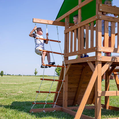 A complete set of wooden mountain-style swings, equipped with a colorful canvas sunshade, a wave slide, a rope swing, a net swing, and a rock wall with climbing ropes and ladders.